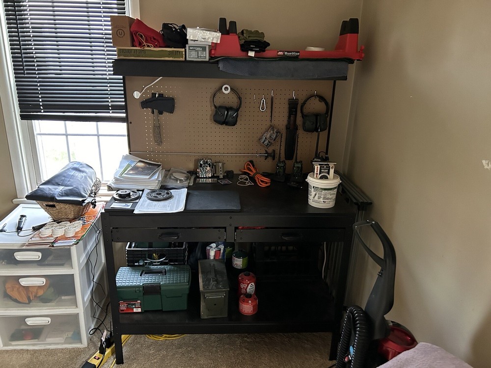 Work Bench With Pegboard Back And Overhead Light.