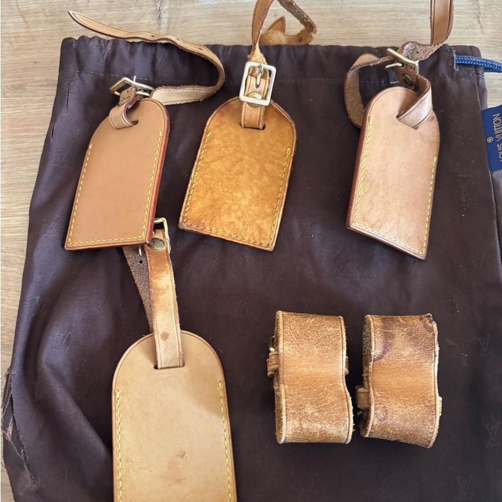 Authentic Louis Vuitton id tags lot with dust bag