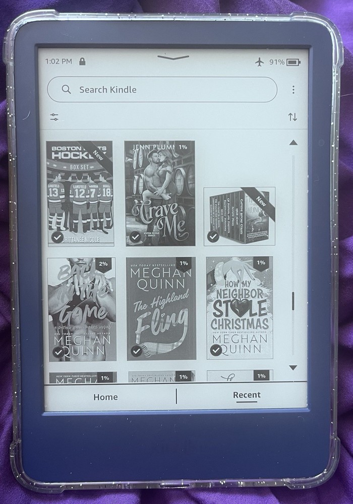 Amazon Kindle ereader Blue with books