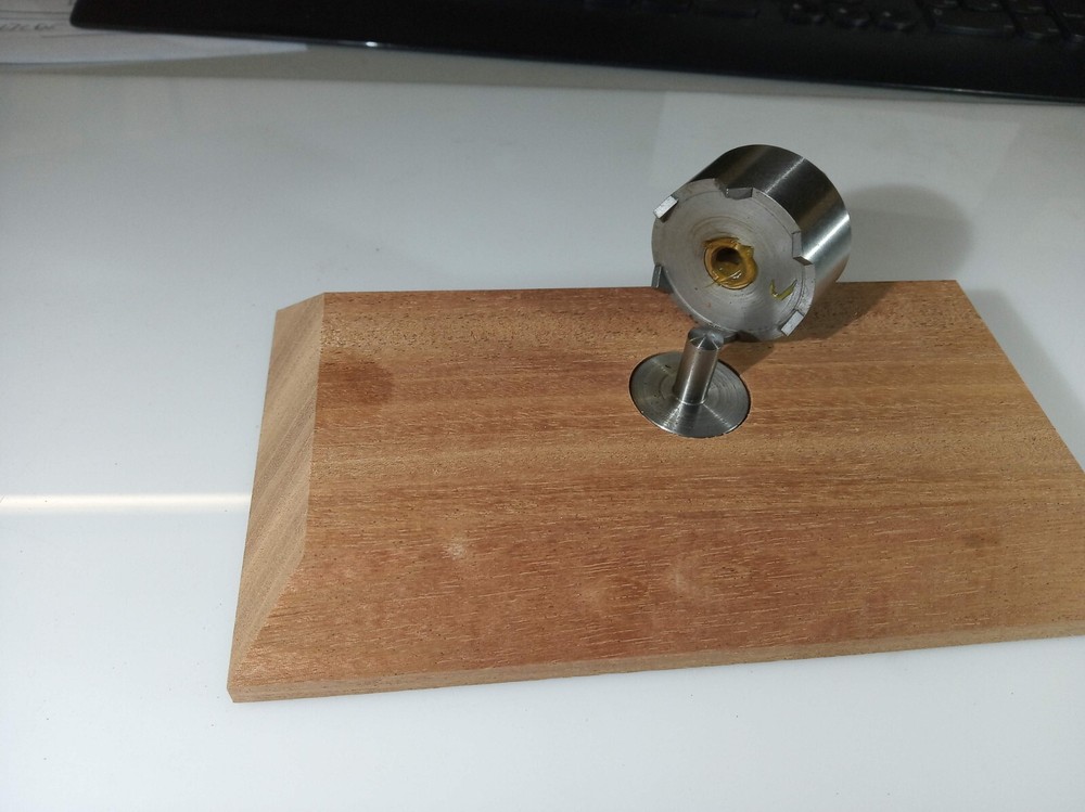 Dinker for jukebox records --cuts clean accurate holes easily.