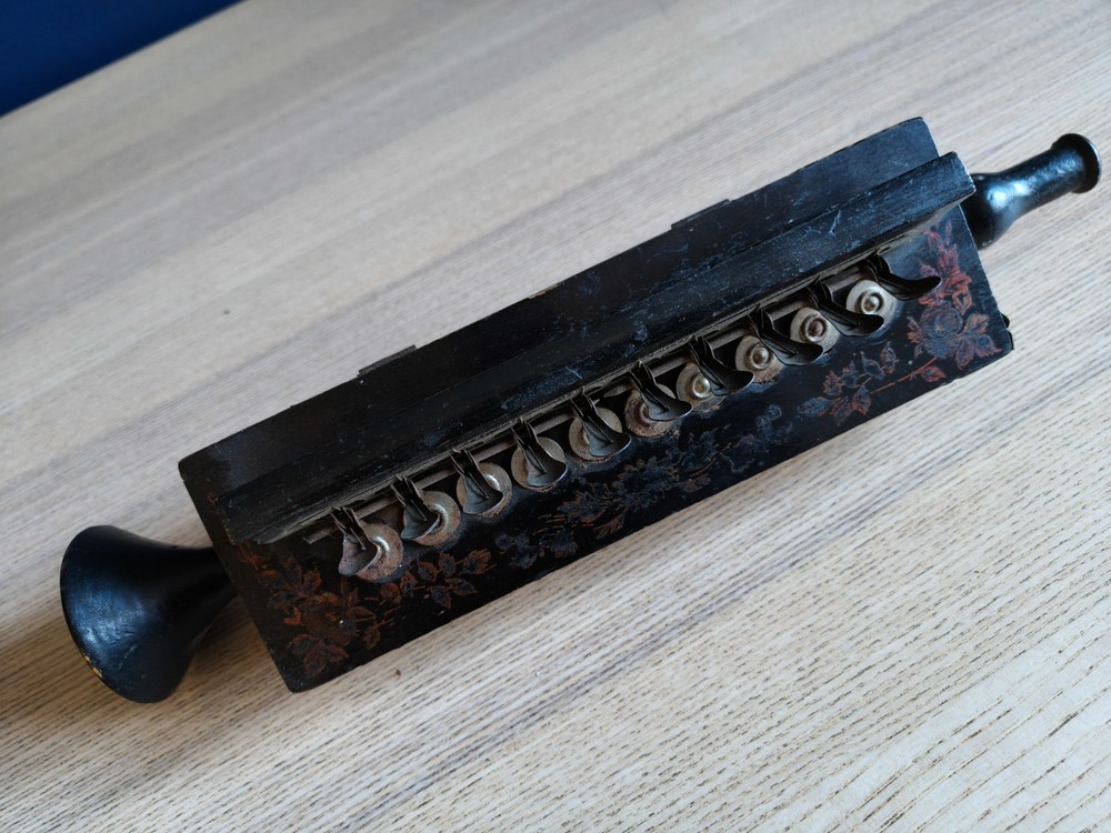 Vintage blow accordion harmonica