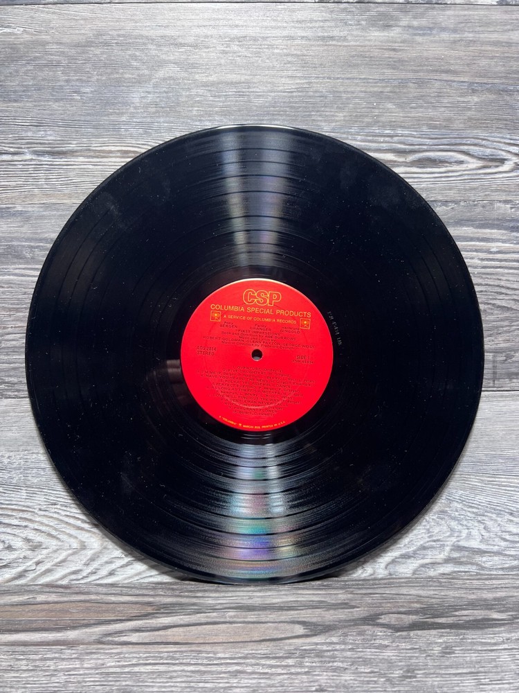 FIRST IMPRESSIONS, VINYL RECORD