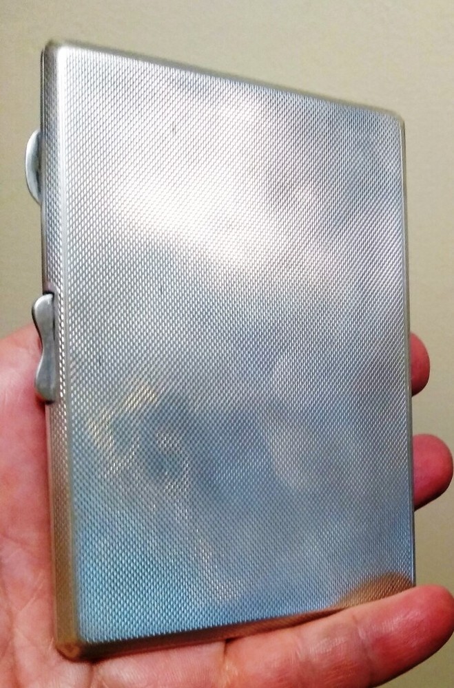 Sterling Silver cigarette case assayed for Birmingham 1936 in good condition.