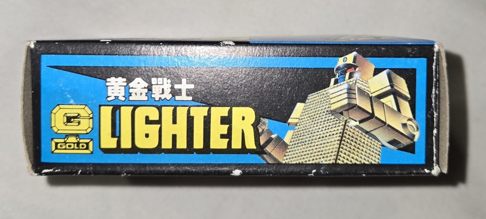 Geni Gold Lighter Robot