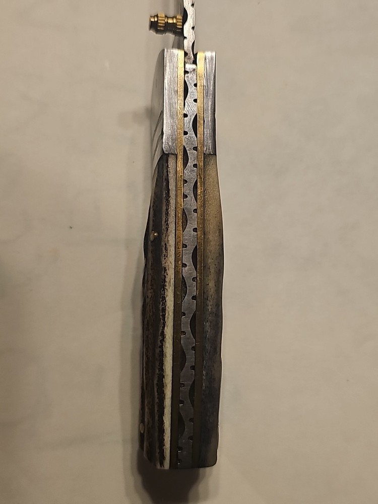 Custom Damascus Blade Lock Back With Textured Handle and leather Sheath