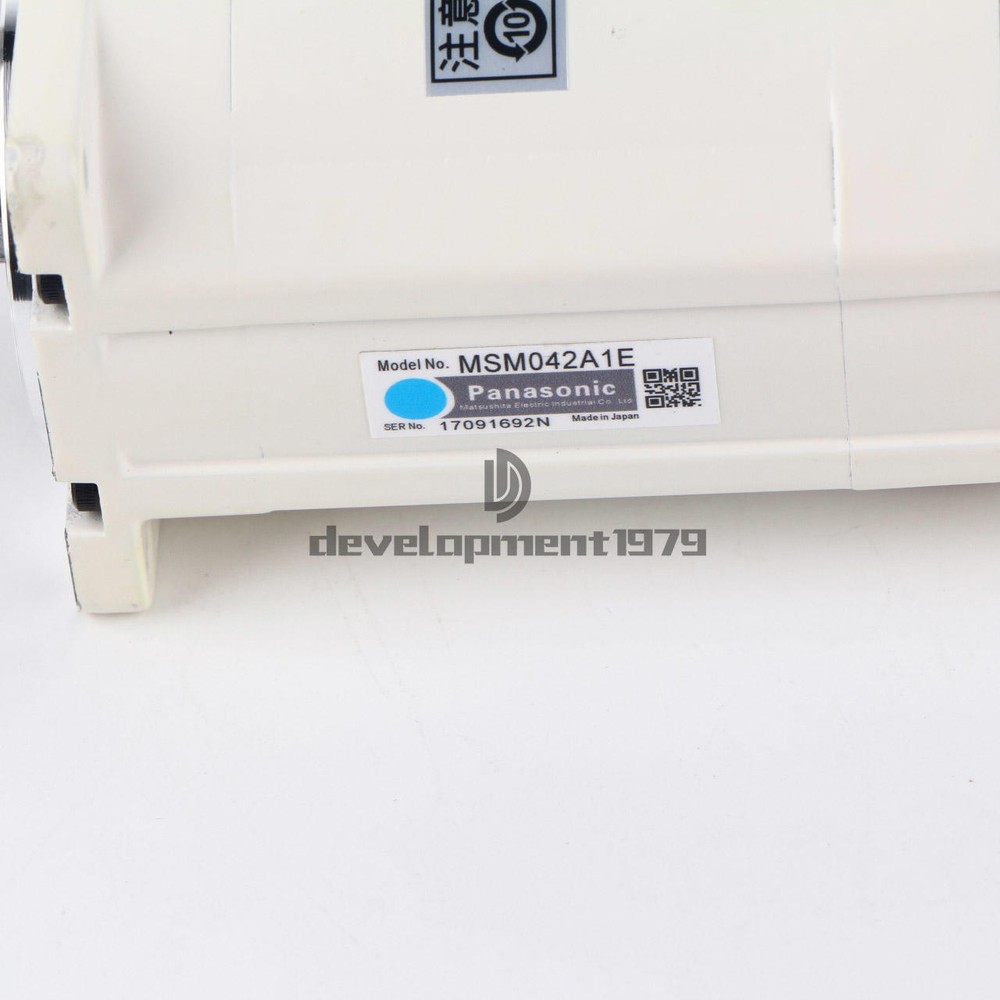 one New Panasonic servo motor MSM042A1E.