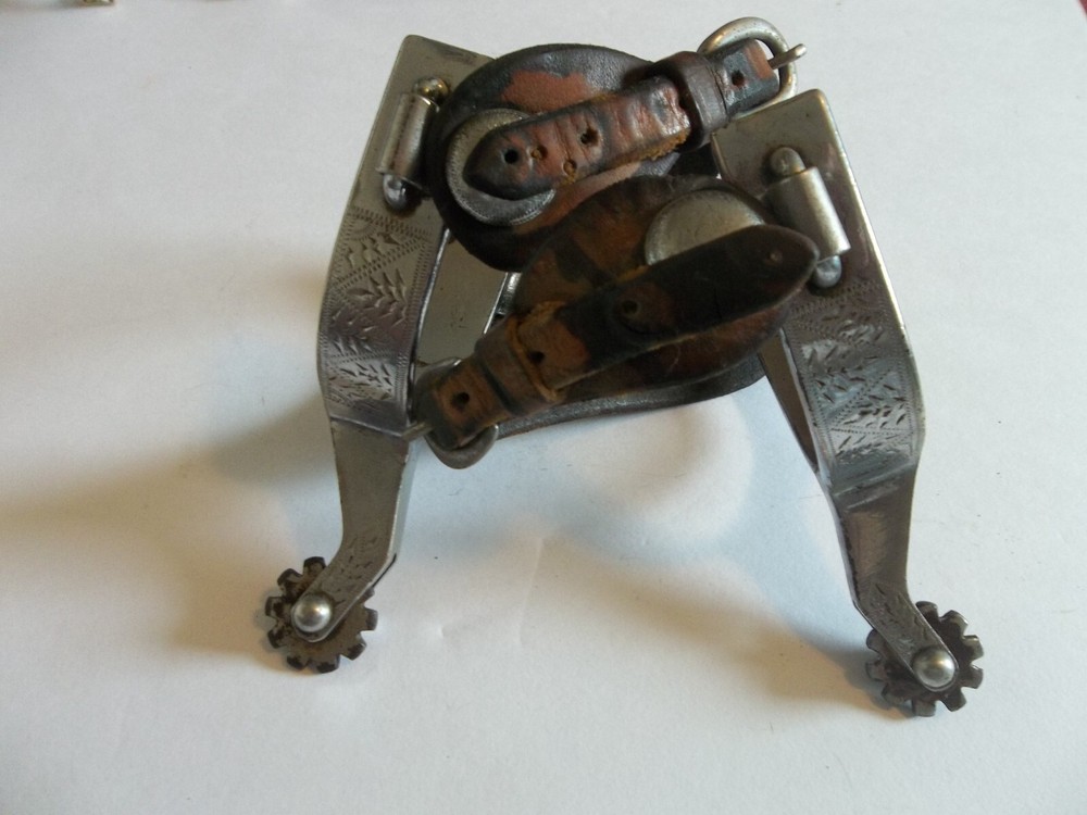 SPURS WITH DESIGN STAMPED ON SIDE #62