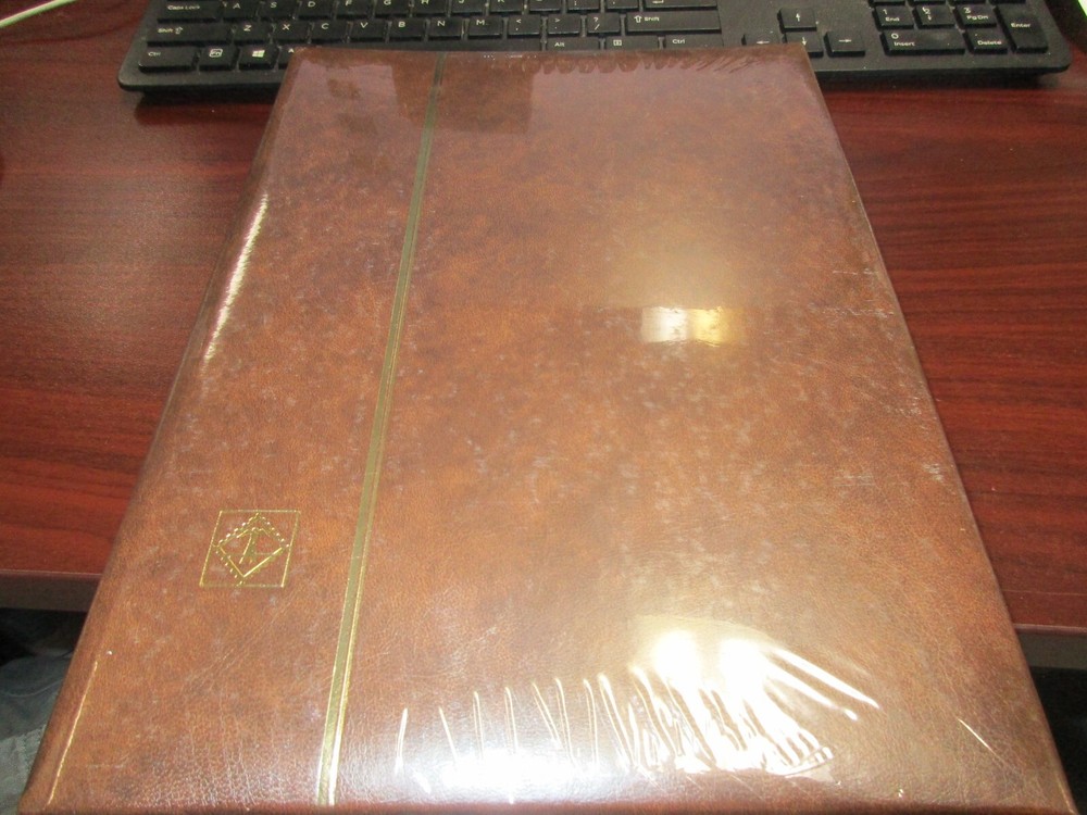 LIGHTHOUSE STOCKBOOK LW4/15,30WHITE PAGES BROWN COVER NEW IN SHRINKWRAP FREESHP