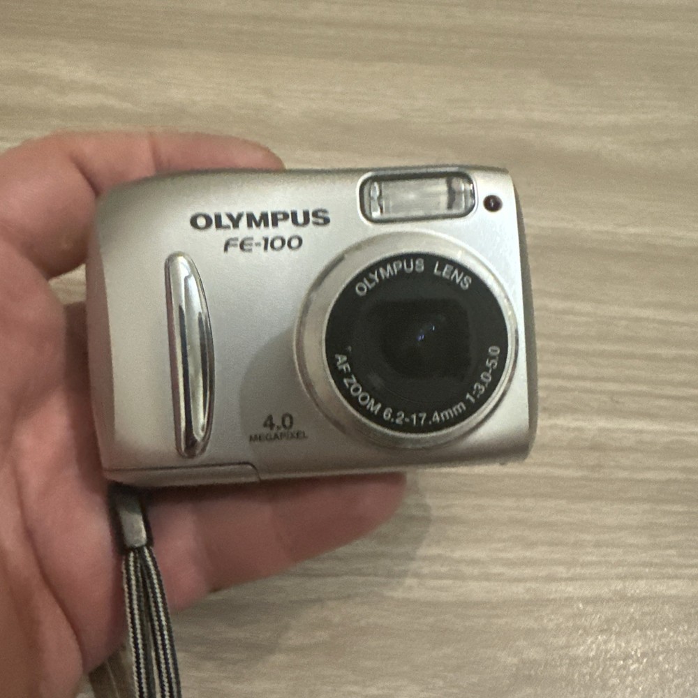 Olympus FE-100 4.0MP Compact Digital Camera Silver  read description