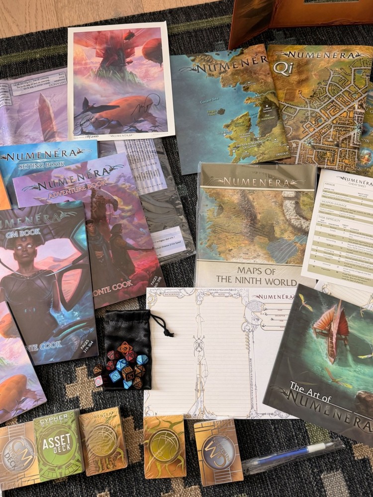 Numenera Reliquary Boxed Set (Kickstarter) and Q-Workshop Dice Sets