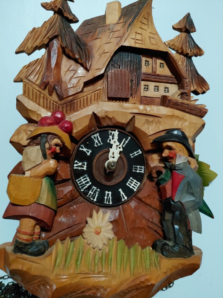 Vintage deeply hand carved Cuckoo clock