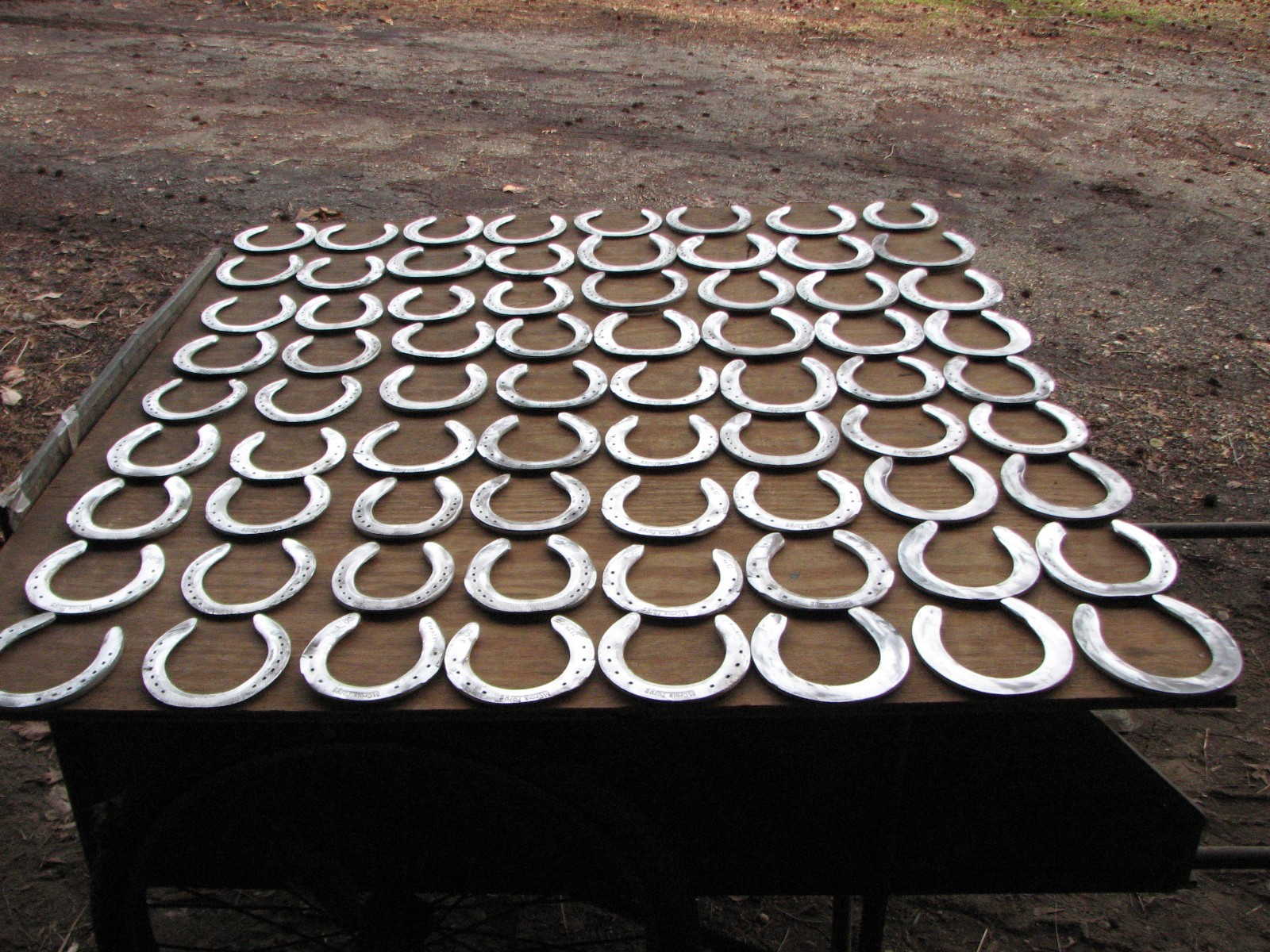 125 used aluminum horseshoes