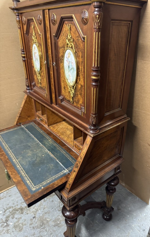 RENAISSANCE WALNUT AND BURLED DROP-FRONT DESK WITH PLAQUES