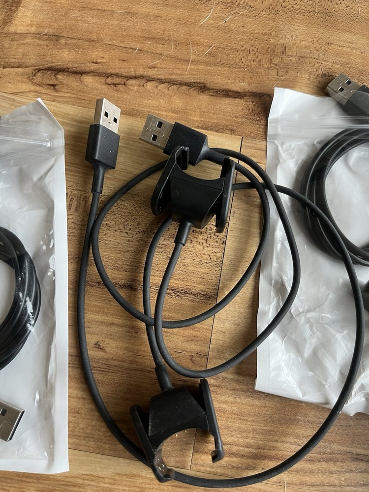 Various Fitbit accessories & Fitbit inspire 2 complete untested , bands chargers