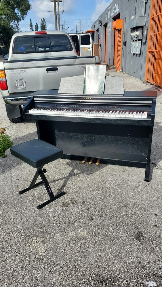 Barely used black kawai digital piano CE220