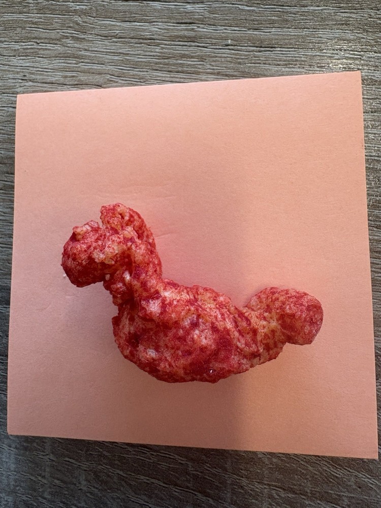 Hot Cheeto Shaped Yoshi.  Super Mario Bros.