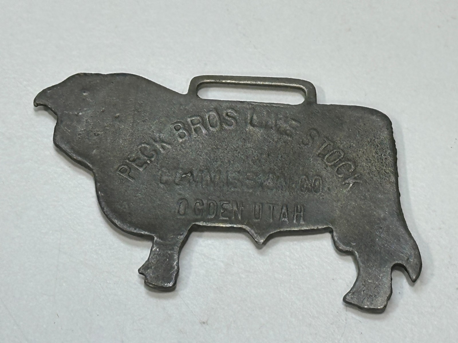 Antique Rare Hereford Bull Advertising watch fob Peck Bros livestock Ogden, UT