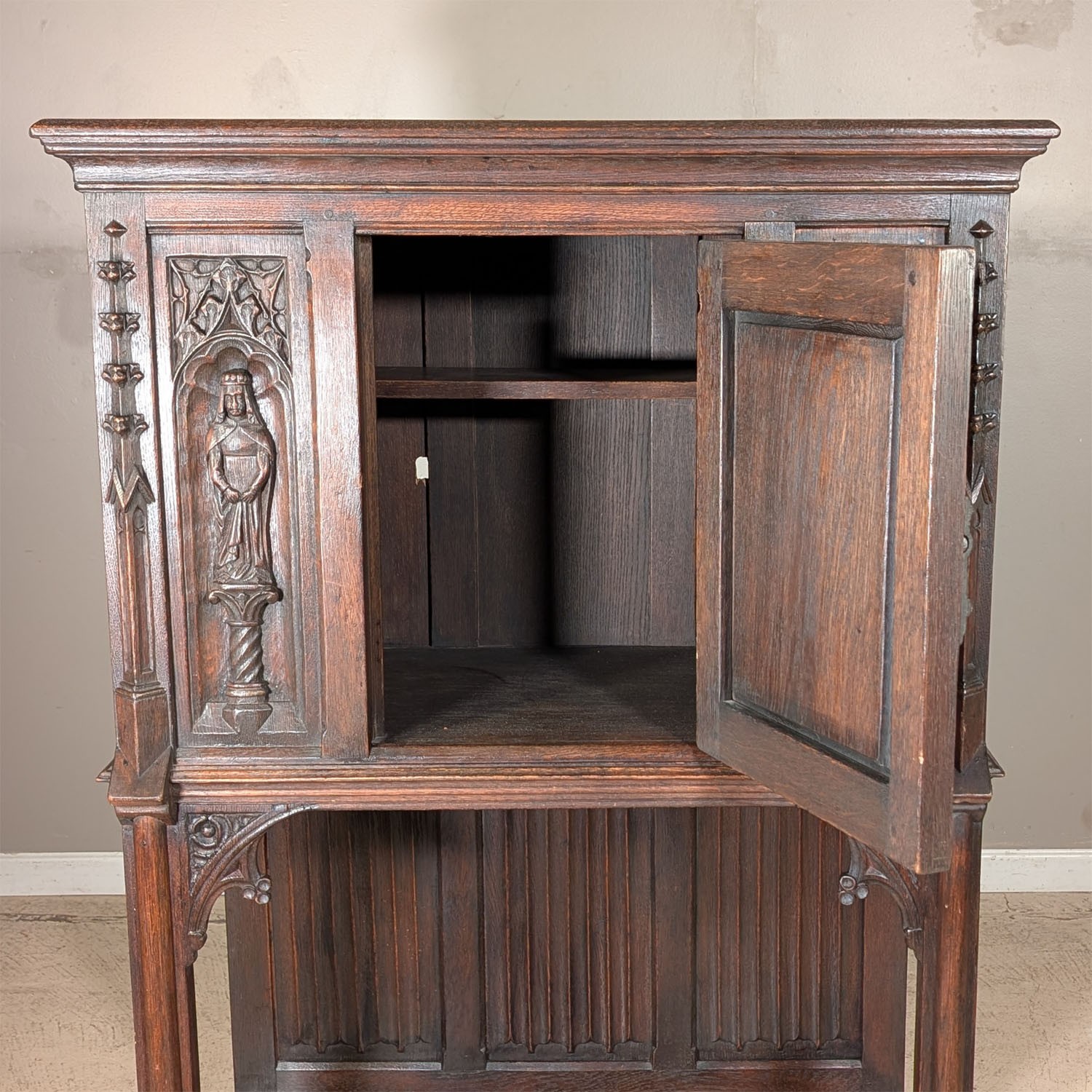 Antique French Gothic Carved Oak Cabinet Stand with Figural Panels Heraldic Door