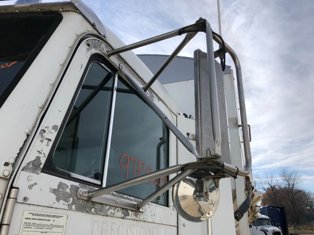 1987-2005 Peterbilt 377 STAINLESS Left/Driver Door Mirror - Used