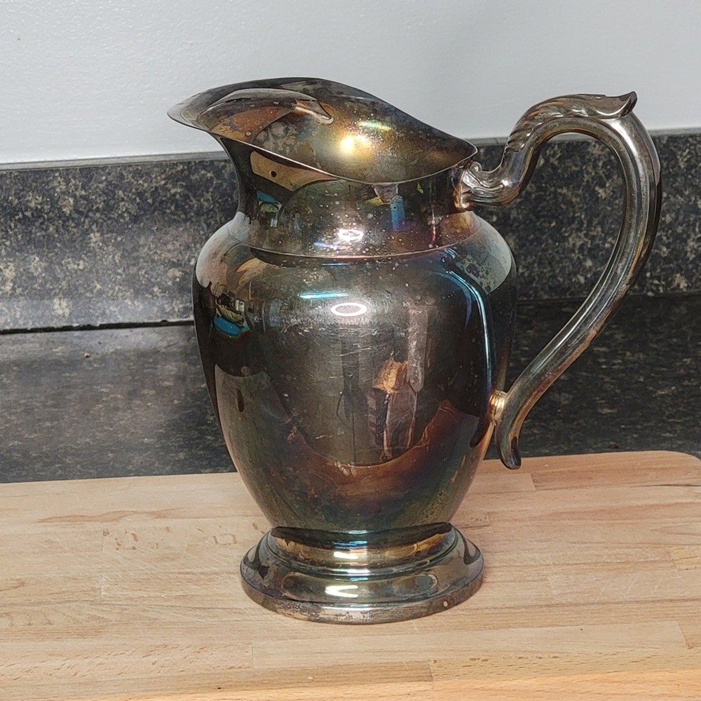 Silver antiqued distressed pitcher