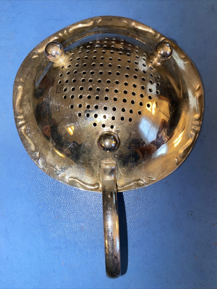 vintage tea strainer antique
