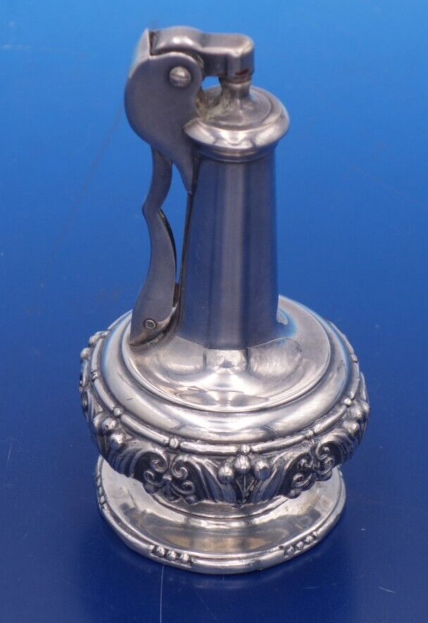 Vintage silver plate decanter lighter by Ronson