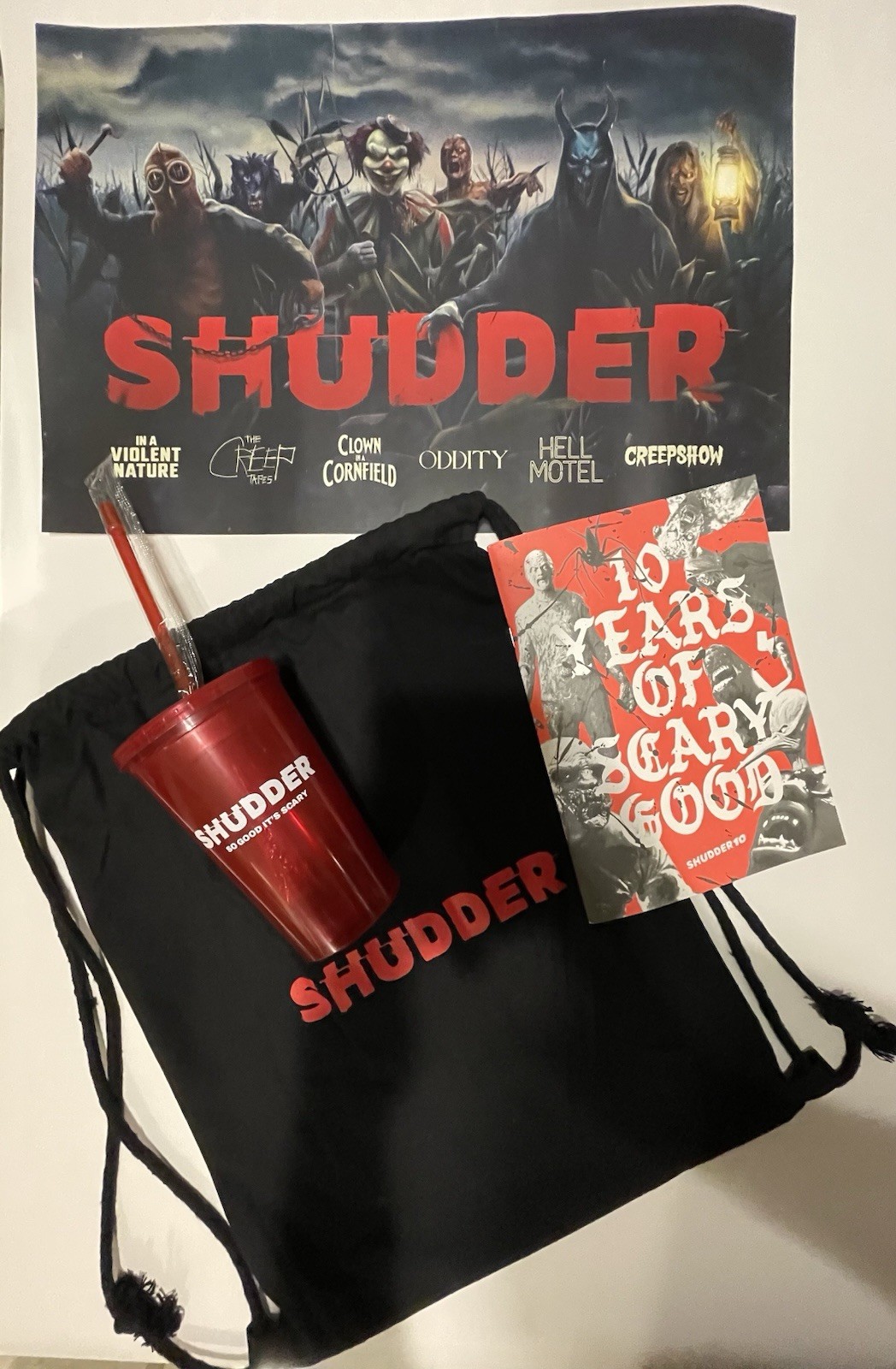 NYCC 2025 EXCLUSIVE~SHUDDER BUNDLE LOT OF 4 ITEMS~BAG, TUMBLER, BOOKLET, POSTER