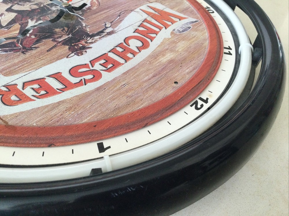 Winchester Forearms & Ammunition Wall Clock. 15” Around.