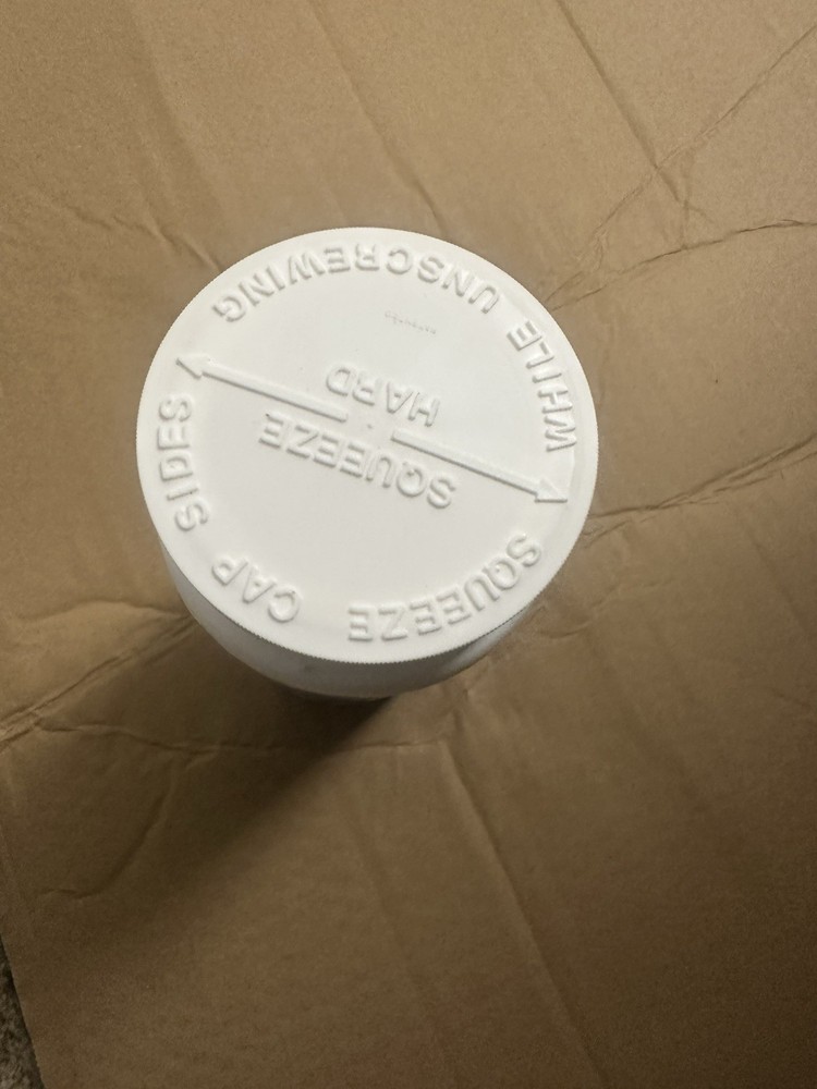 Opened HTH Pool Care 1” Chlorine Tabs & Dispenser