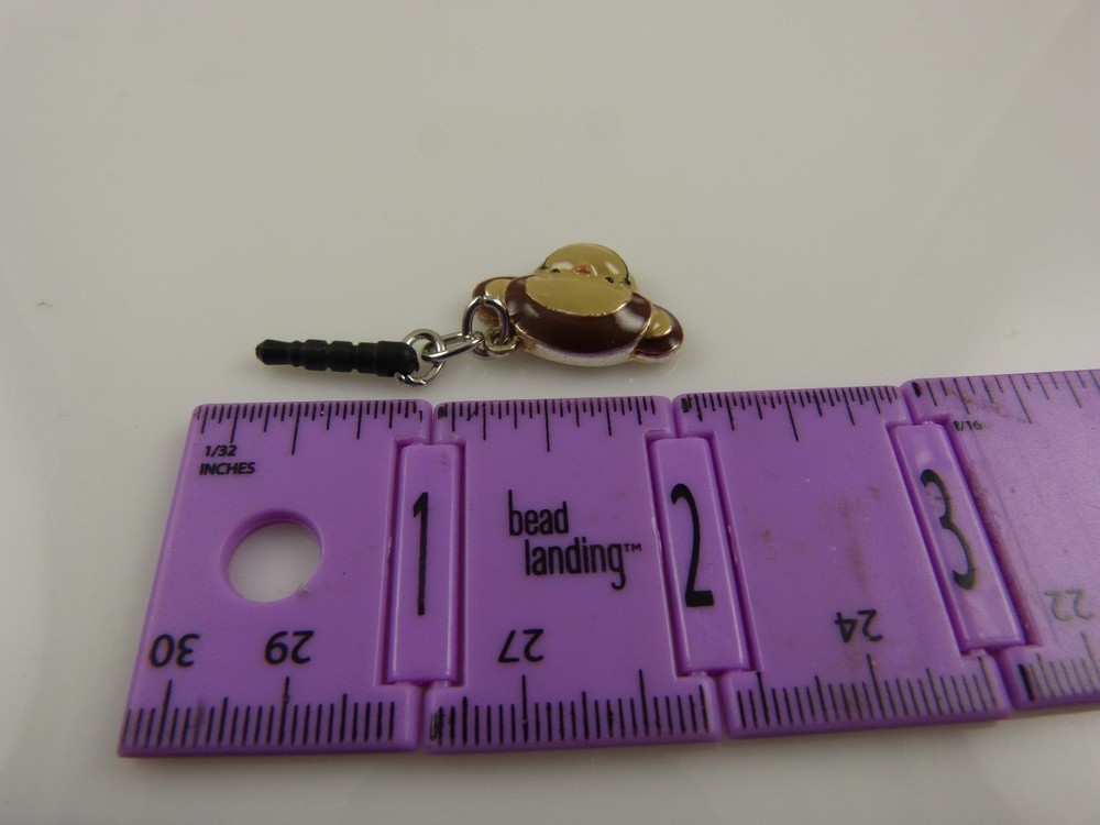 Monkey head smiling cell phone fits Ipad charm ear cap dust plug