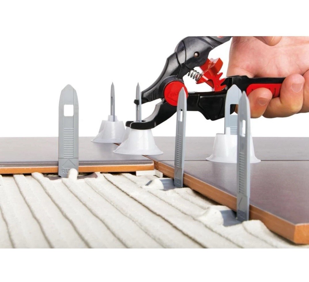 RUBI Tile Level Quick Kit. Includes 100 Straps, 100 Re-Usable Caps and 1 Quick