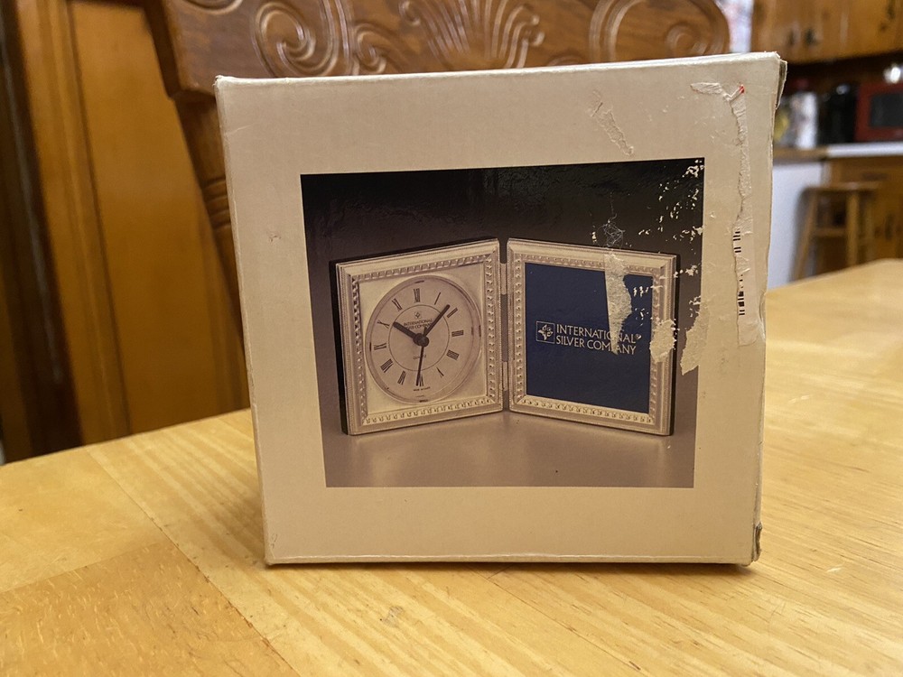 Silver plated double frame clock