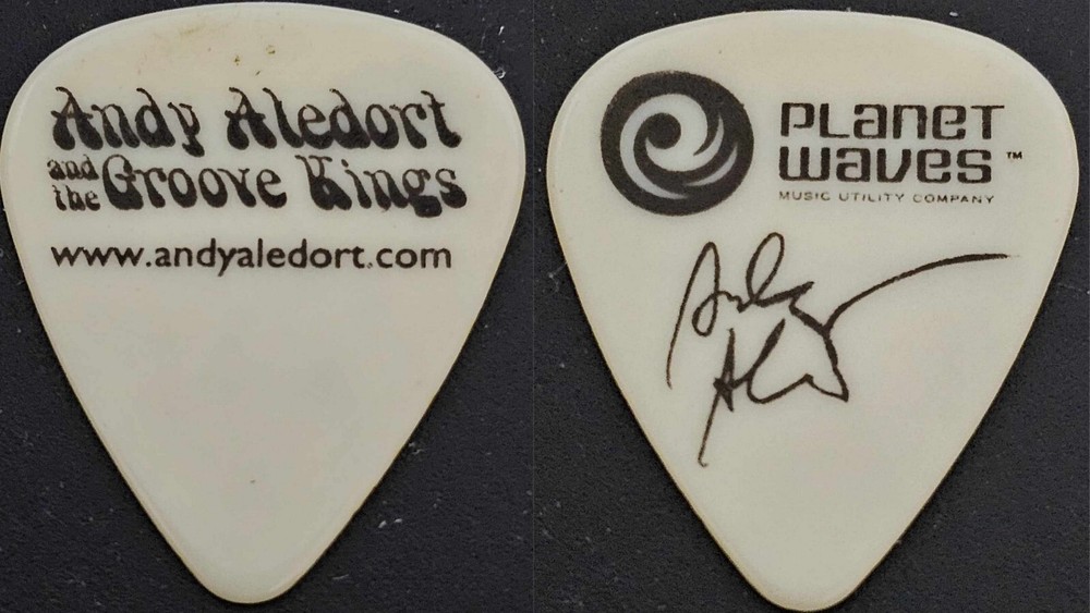 Andy Aledort off white guitar pick