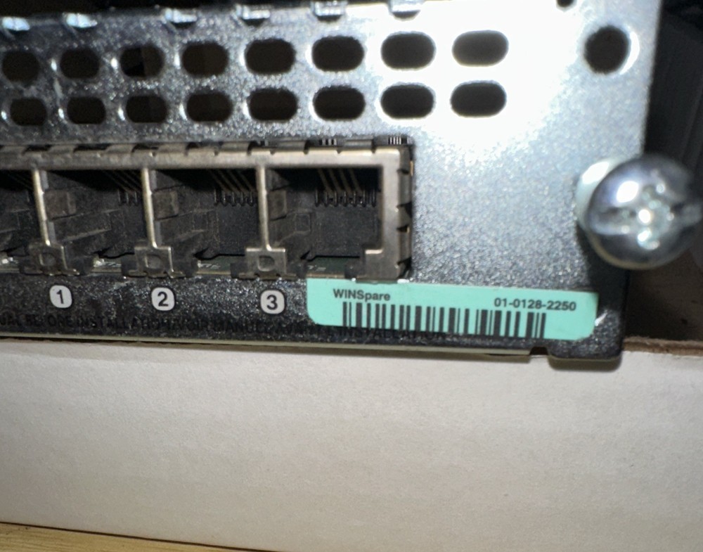 Cisco NIM-4FXSP 4-Port Network Interface Module.