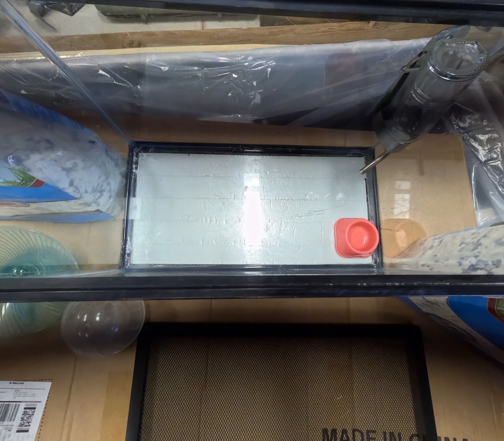 Hamster terrarium with supplies