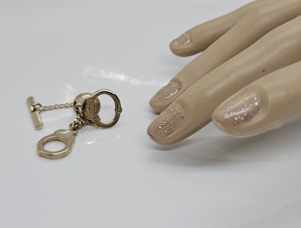 Hand Cuff Gold Tone Lapel Pin