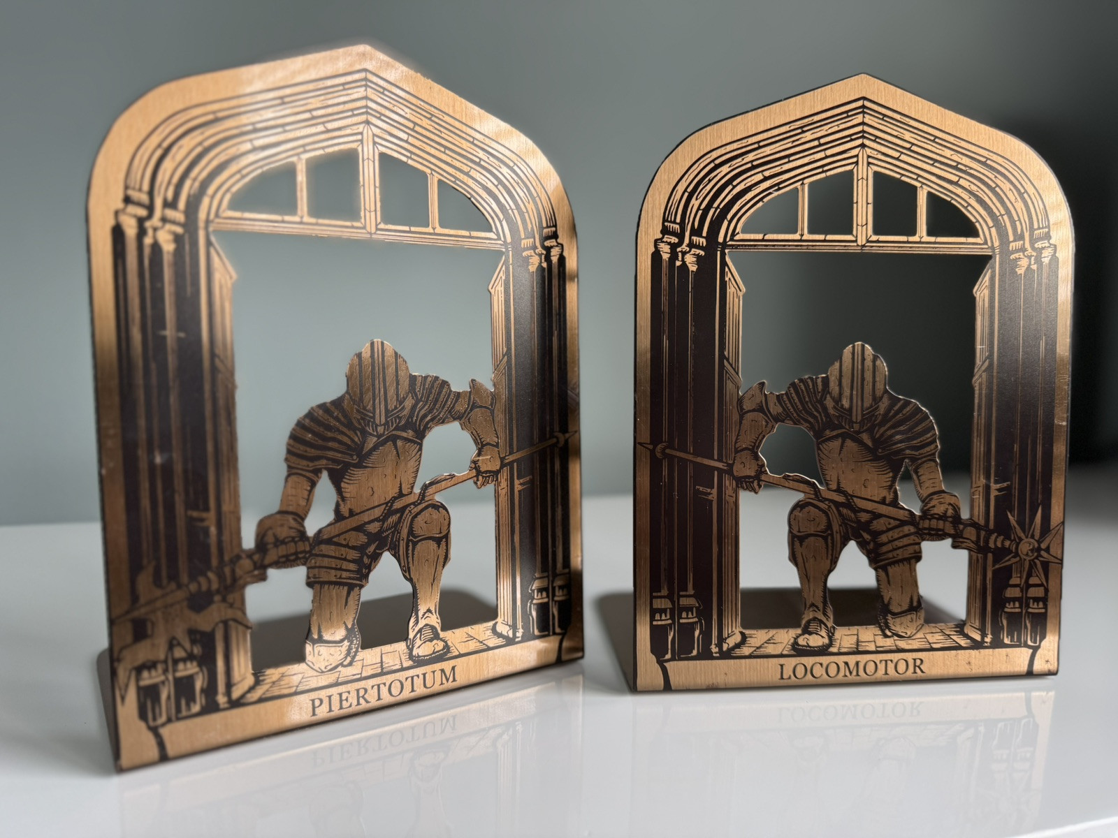 Harry Potter Guardians Of Hogwarts Bookends Locomotor And Piertotum Knights
