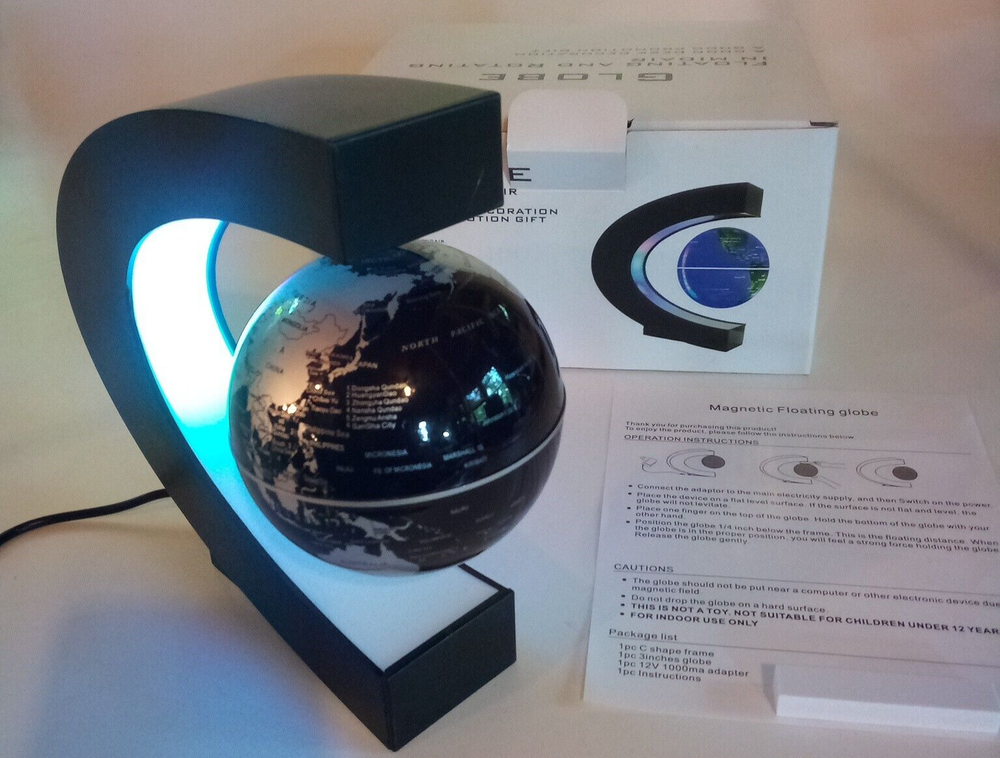 Globe Magnetically Floating in Midair Colorfully Lighted Black & Silver Globe