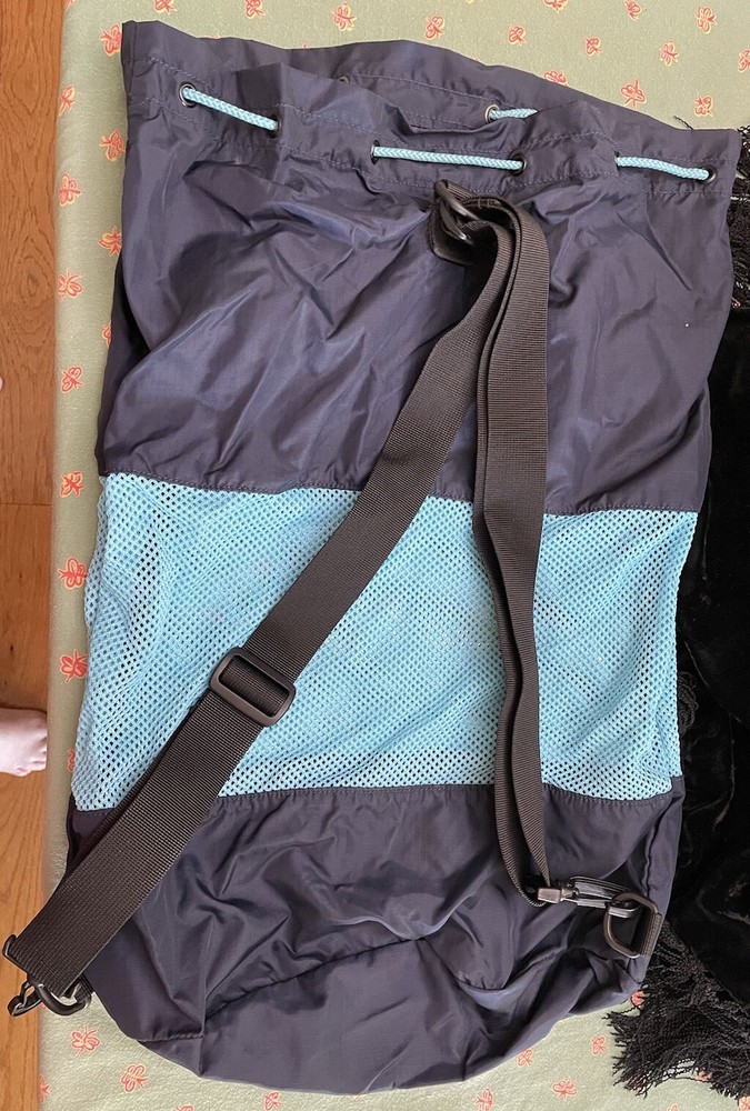 Eddie Bauer navy and teal drawstring bag with backpack straps