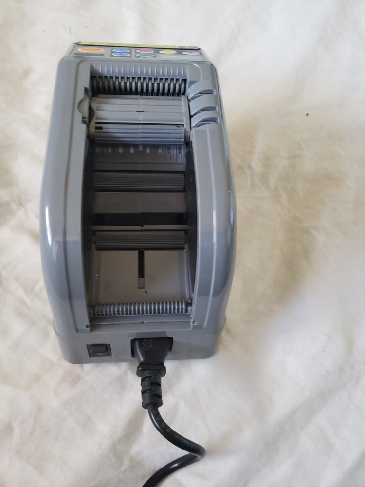 RT-7000 AUTOMATIC TAPE CUTTING MACHINE