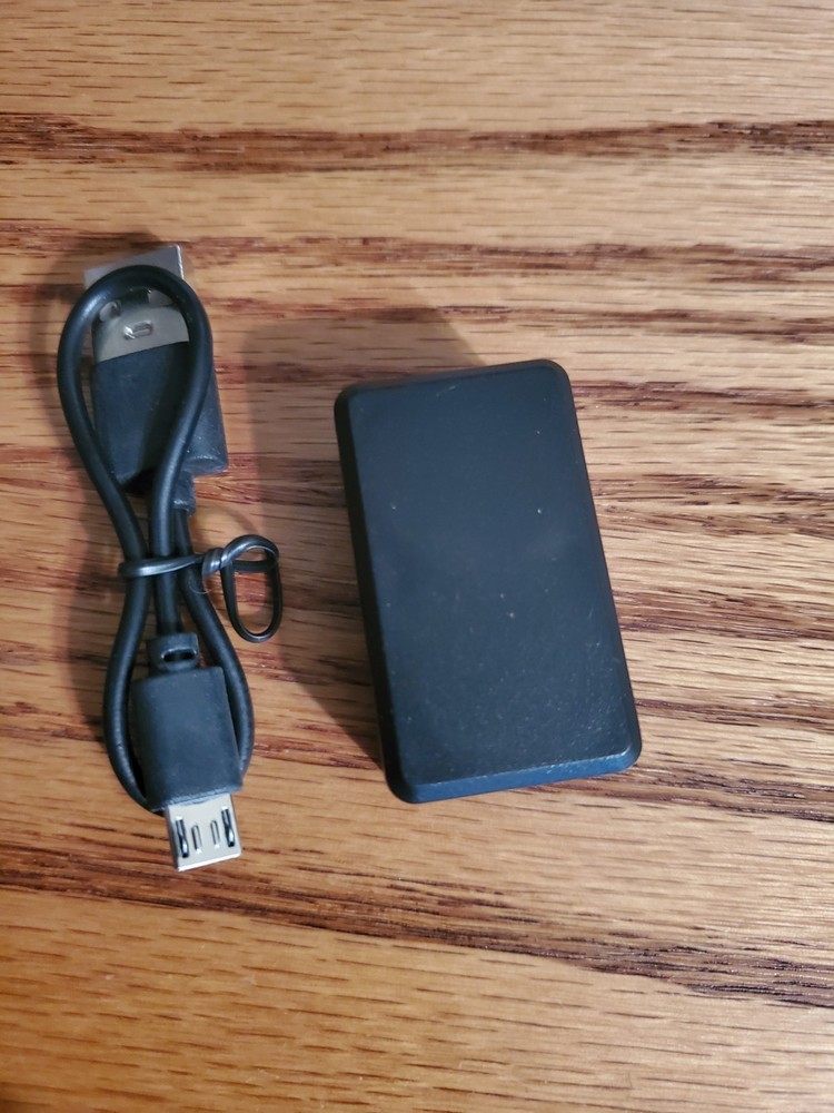 Unbranded GPS Unit, Charge Cord & Pamplet