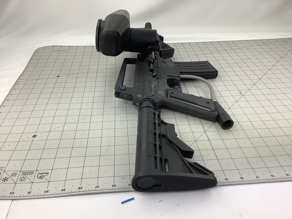 Tippmann Alpha black paintball marker with e trigger and cyclone feed untested