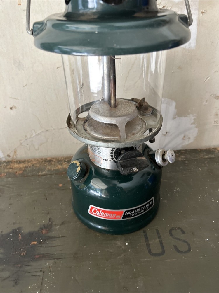 COLEMAN ADJUSTABLE TWO MANTLE LANTERN WITH Date 5-86