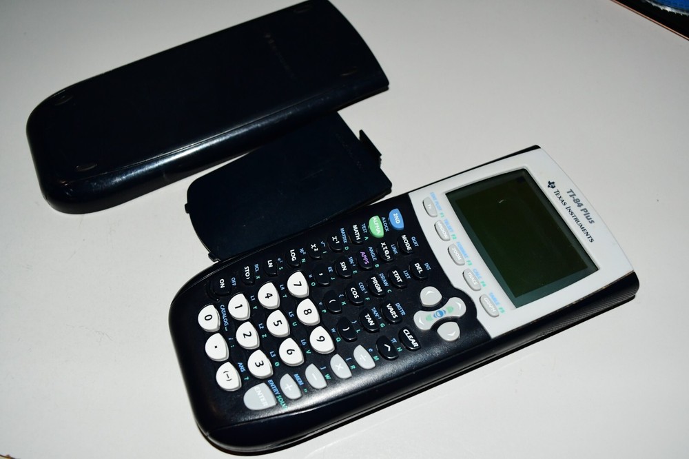 Texas Instruments TI-84 Plus Graphics Calculator with spot on OUTER screen works