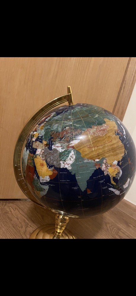 Blue lapis gemstone world map globe
