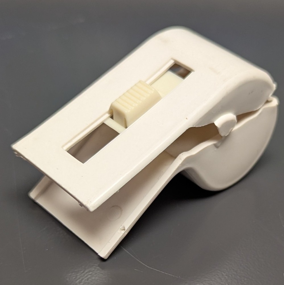 Vintage Postage Stamp Roll Dispenser