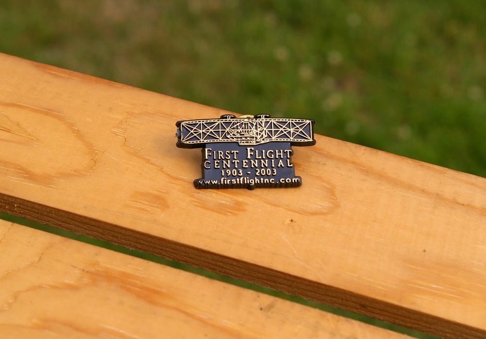 First Flight Centennial 1903-2003 Plastic Biplane Lapel Pin Pinback