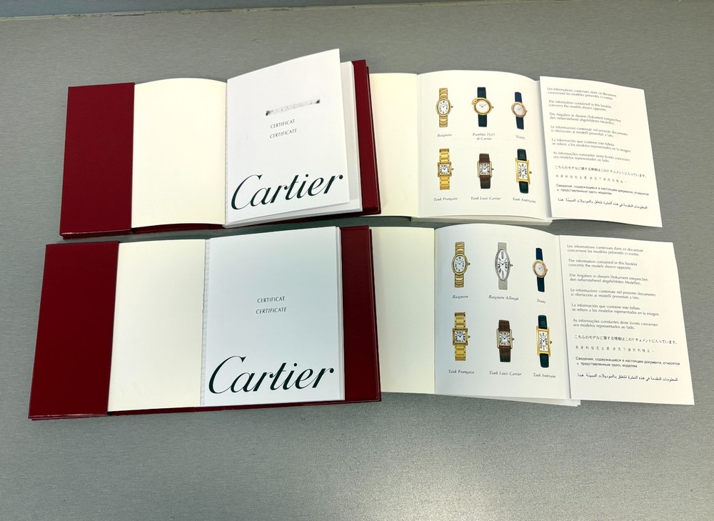 Two Cartier Original Certificate & Instruction Booklet's