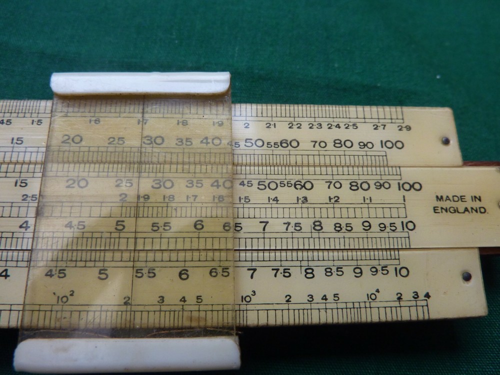 THE "UNIQUE" LOG-LOG SLIDE RULE