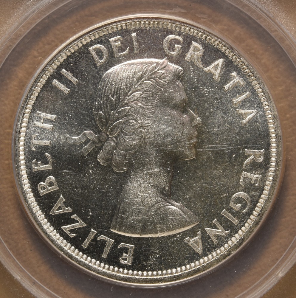 1953 Canada Silver Dollar with Strap ANACS MS63